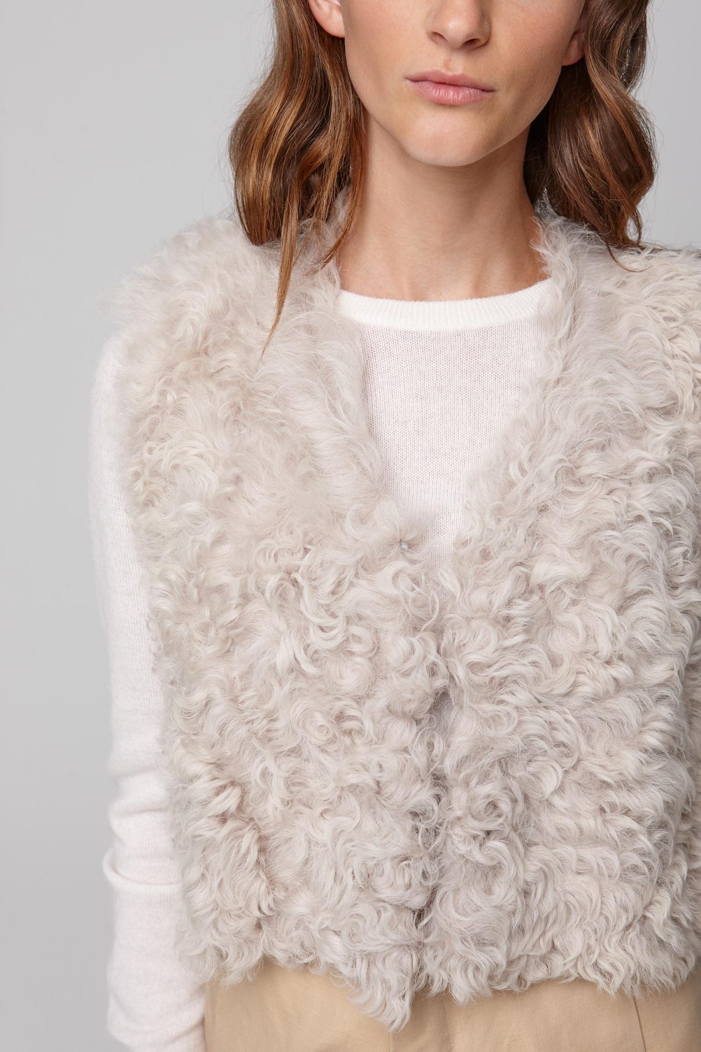 V Neck Cropped White Shearling Gilet | Womens luxury shearling | Gushlow & Cole - model crop