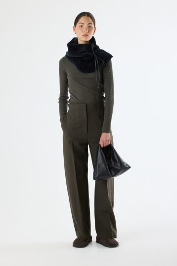 Clara Small Black Leather Shoulder Bag | Bags | Gushlow & Cole - model full length holding bag