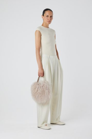 Mongolian Shearling Cream Saddle Bag | Bags | Gushlow & Cole - model full length