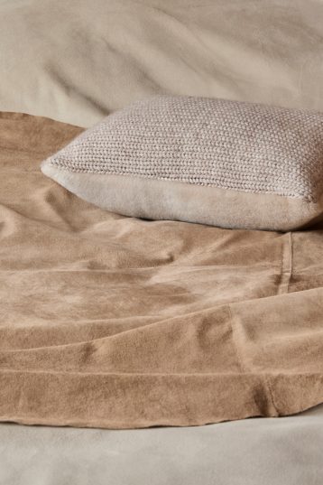 Beige Shearling and Knit Square Cushion | Home | Gushlow & Cole - cushion on bed with throw